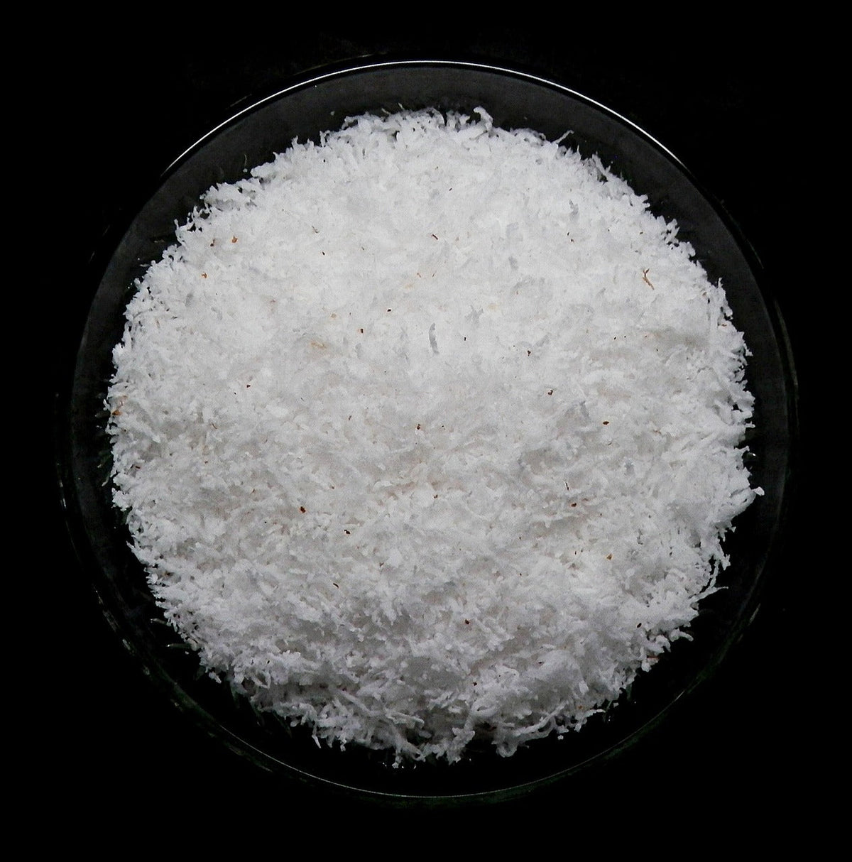 UK Khopra Powder 100G - desiccated coconut on white background