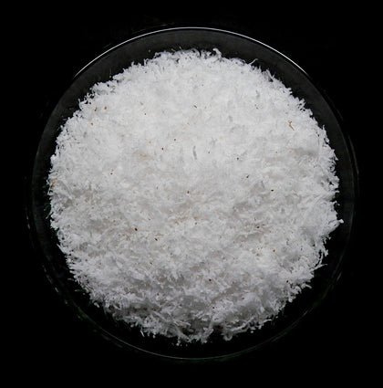 UK Khopra Powder 100G - desiccated coconut on white background
